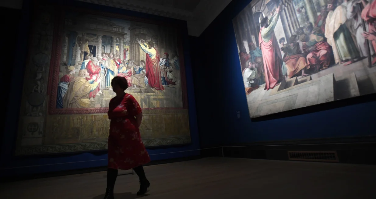 epa09872791 A tapestry (R) titled 'Saint Paul Preaching at Athens' (151-19),' by Italian artist Raphael (1483-1520) is on display at the National Gallery in London, Britain, 04 April 2022. 'The Credit Suisse Exhibition: Raphael' opens to the public from 09 April until 31 July 2022 and features ' loans from the Louvre, National Gallery of Art, Washington, the Prado Museum, Uffizi Museum and the Vatican Museum', the National Gallery says on their website. EPA/ANDY RAIN/Andy Rain