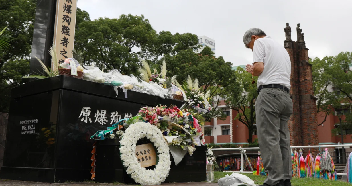 epa08592820 An atomic-bomb survivor offers a prayer for victims killed by the 1945 atomic bombing in front of the Hypocenter Cenotaph at Nagasaki Peace Park in Nagasaki, southwestern Japan, 09 August 2020, marking the 75th anniversary of the atomic bombing in 1945. It is said about 74,000 residents were killed by the atomic bombing. An atomic bomb exploded on 09 August 1945 in the sky about 500 meters above the point where this monument stands. By the end of December, some 74,000 people had died and some 75,000 suffered from various injuries, according to Nagasaki City officials. EPA/JIJI JAPAN OUT EDITORIAL USE ONLY/ NO ARCHIVES/Jiji