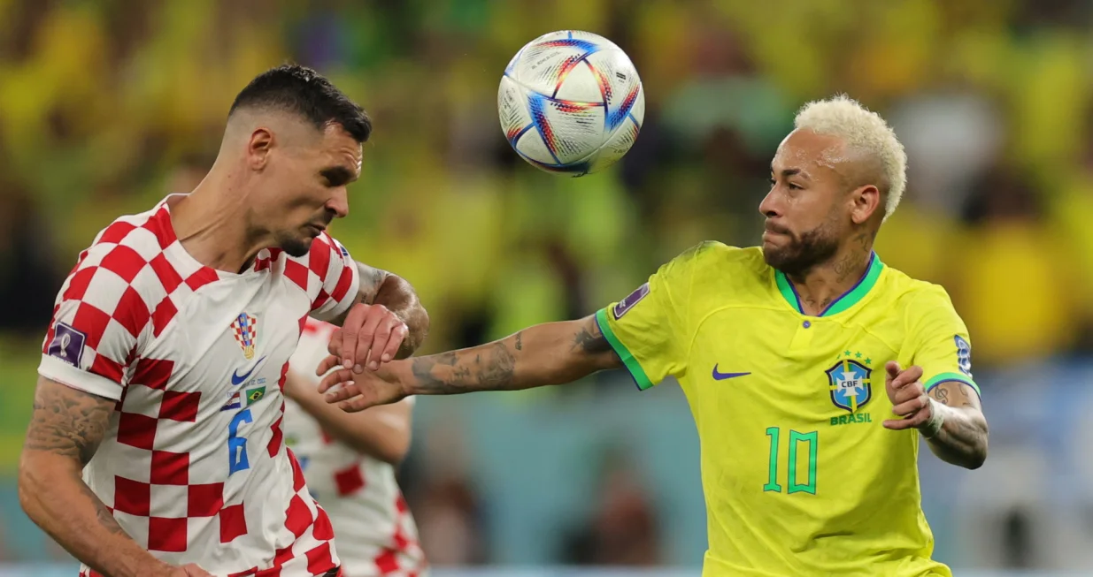 epa10357367 Dejan Lovren of Croatia in action against Neymar (R) of Brazil during the FIFA World Cup 2022 quarter final soccer match between Croatia and Brazil at Education City Stadium in Doha, Qatar, 09 December 2022. EPA/Friedemann Vogel