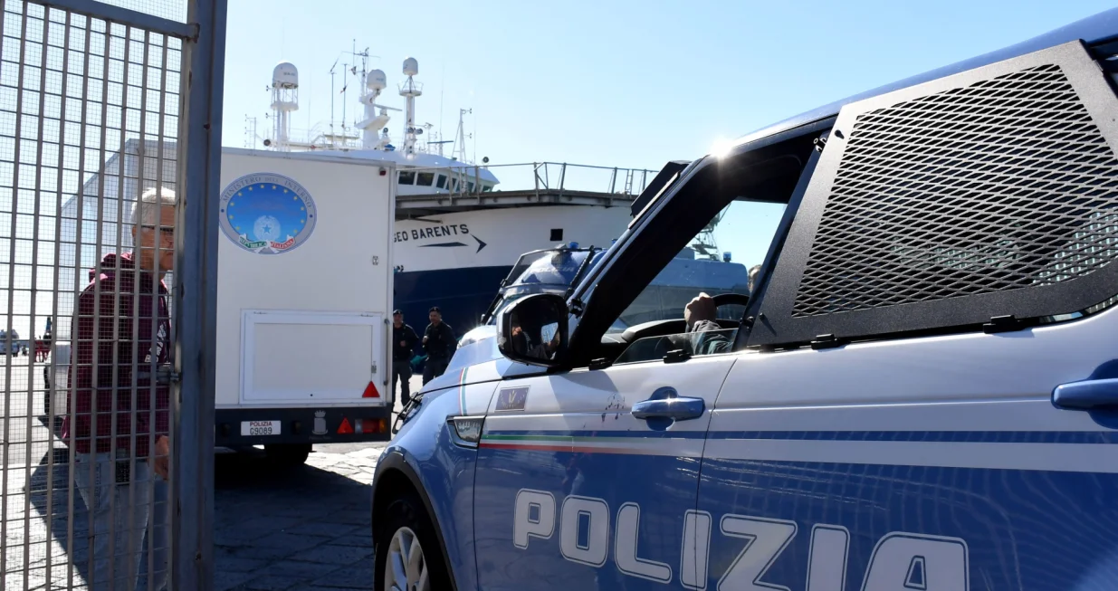 epa10293424 A police car arrives at the port of Catania after the arrival of yhe Geo Barents ship at the 10 pier, Catania, Italy, 08 November 2022. Italian authorities on 08 November allowed a group of 89 asylum seekers rescued by the NGO Rise Above search-and-rescue ship to disembark in Reggio Calabria, however over 200 people remain on two other ships in Catania, the Geo Barents and the Humanity 1, as the government only allowed people considered vulnerable to leave the vessels after they docked in Sicily at the weekend. EPA/ORIETTA SCARDINO/Orietta Scardino