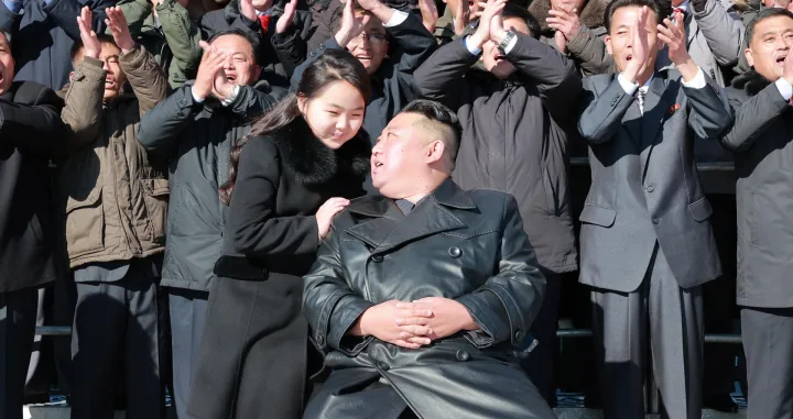 epa10331641 An undated photo released by the official North Korean Central News Agency (KCNA) on 27 November 2022 shows North Korean leader Kim Jong-un (front, C) posing with his daughter, presumed to be his second child, Ju-ae (C-L), during a photo session with the contributors to the successful test-fire of new-type ICBM Hwasongpho-17 at an undisclosed location in North Korea. EPA/KCNA  EDITORIAL USE ONLY/Kcna