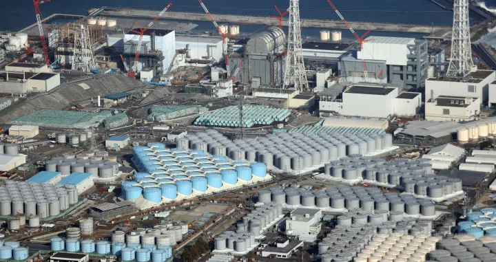 epa09131838 An aerial view shows tanks containing contaminated water at the Fukushima Daiichi nuclear power plant, which suffered meltdowns on 11 March 2011, in Fukushima prefecture, northeastern Japan, 14 February 2021 (reissued 13 April 2021). On 13 April 2021, the Japanese government officially decided to release treated water containing tritium from the crippled Fukushima Daiichi Nuclear Power Plant into the ocean. EPA/JIJI PRESS JAPAN OUT EDITORIAL USE ONLY/ NO ARCHIVES/Jiji Press