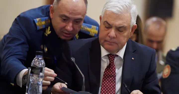 epa10309923 Romanian Minister of Defense Angel Tilvar (R) attends the annual meeting of the South-East European Defense Ministerial (SEDM) in Sofia, Bulgaria, 17 November 2022. This year's forum will be held under the sign of the events taking place on the territory of Ukraine. EPA/VASSIL DONEV/Vassil Donev