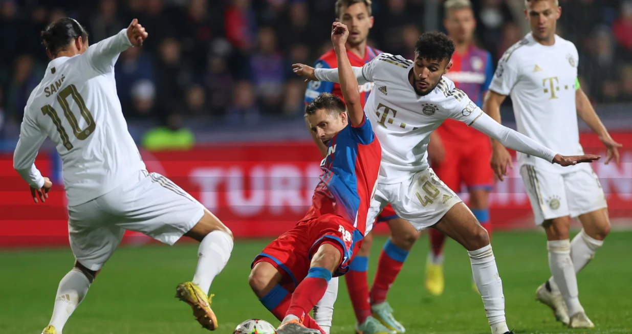 epa10239553 Viktoria's Adam Vlkanova (C) in action against Bayern's Leroy Sane (L) and Noussair Mazraoui (R) during the UEFA Champions League group C soccer match between Viktoria Plzen and Bayern Munich in Plzen, Czech Republic, 12 October 2022. EPA/Martin Divisek