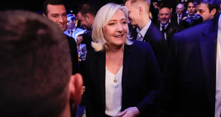 epa10287632 Marine Le Pen, ex-president of France's far right Rassemblement National (RN) party, reacts during the 18th RN party Congress in Paris, France, 05 November 2022. The congress chose Eurodeputy Jordan Bardella as new party leader. EPA/TERESA SUAREZ/Teresa Suarez