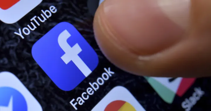 epa08925058 (FILE) - A close-up image showing the Facebook app on an iPhone in Kaarst, Germany, 08 November 2017 (reissued 07 January 2021). Facebook CEO Mark Zuckerberg on 07 January 2021 announced on his platform that the block placed on US President Donald J. Trump's on 06 January 2021 was being extended for his 'Facebook and Instagram accounts indefinitely and for at least the next two weeks until the peaceful transition of power is complete'. The move comes after various groups of President Trump's supporters broke into the US Capitol in Washington, DC and rioted as Congress met to certify the results of the 2020 US Presidential election. EPA/SASCHA STEINBACH *** Local Caption *** 56109918/Sascha Steinbach
