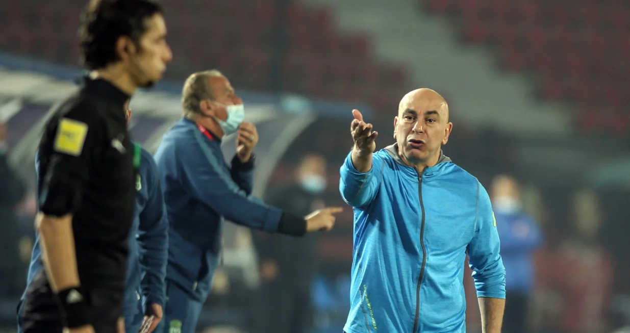 epa08908348 Al Ittihad head coach Hossam Hassan gestures during the Egyptian Premier League soccer match between Al-Ahly and Al Ittihad at Al Salam Stadium in Cairo, Egypt, 28 December 2020. EPA/MOHAMED HOSSAM