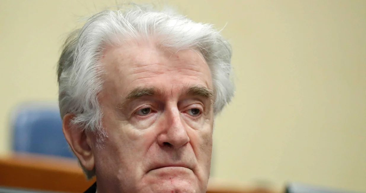 epa08529984 (FILE) - Former Bosnian Serb leader Radovan Karadzic appears in a courtroom before the International Residual Mechanism for Criminal Tribunals (MICT), which handles outstanding war crimes cases for the Balkans and Rwanda, in The Hague, The Netherlands, 24 April 2018 (reissued 06 July 2020). A quarter of a century ago, the world witnessed the worst mass murder on European soil since World War II. Some 7,000-8,000 Bosniaks were slaughtered and 20,000 civilians were forcibly displaced in an act of ethnic cleansing perpetrated in the small eastern Bosnian village of Srebrenica, whose name will forever be linked to the infamous 1995 massacre. Today, 25 years after the massacre, the memory of its victims is kept alive by several institutions, such as the Museum of Crimes Against Humanity and Genocide in Sarajevo or a permanent exhibit at the 'Memorial Center Srebrenica-Potocari' that now occupies the former headquarters of the Dutch UNPROFOR Battalion. EPA/YVES HERMAN/POOL ATTENTION: This Image is part of a PHOTO SET/Yves Herman/Pool