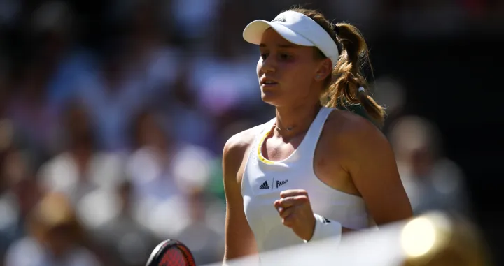 epa10061743 Elena Rybakina of Kazakhstan celebrates after breaking the serve of her opponent in the third set in the women's final match against Ons Jabeur of Tunisia at the Wimbledon Championships, in Wimbledon, Britain, 09 July 2022. EPA/NEIL HALL  EDITORIAL USE ONLY