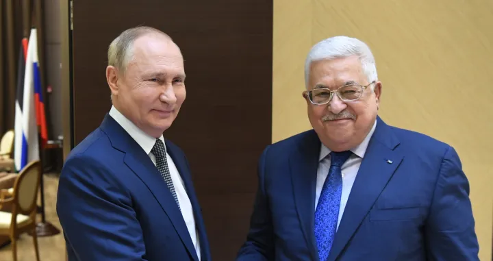 epa09598803 Russian President Vladimir Putin (L) and Palestinian President Mahmoud Abbas (R) shake hands during their meeting at the Black Sea resort of Sochi, Russia, 23 November 2021. Abbas is on a working visit to Russia. EPA/YEVGENY BIYATOV/KREMLIN POOL/SPUTNIK MANDATORY CREDIT/Yevgeny Biyatov/Kremlin Pool/Sputnik