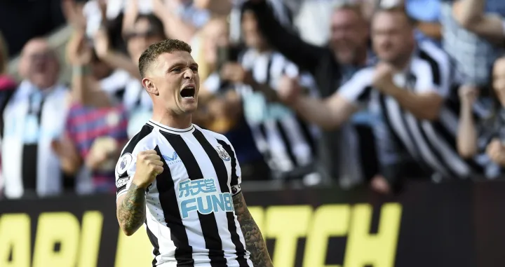 epa10132238 Kieran Trippier of Newcastle United celebrates after scoring the 3-1 lead during the English Premier League soccer match between Newcastle United and Manchester City in Newcastle, Britain, 21 August 2022. EPA/PETER POWELL EDITORIAL USE ONLY. No use with unauthorized audio, video, data, fixture lists, club/league logos or 'live' services. Online in-match use limited to 120 images, no video emulation. No use in betting, games or single club/league/player publications