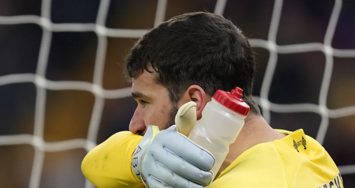 epa10378737 Liverpool's goalkeeper Alisson reacts during the English Premier League soccer match between Aston Villa and Liverpool in Birmingham, Britain, 26 December 2022. EPA/Tim Keeton EDITORIAL USE ONLY. No use with unauthorized audio, video, data, fixture lists, club/league logos or 'live' services. Online in-match use limited to 120 images, no video emulation. No use in betting, games or single club/league/player publications