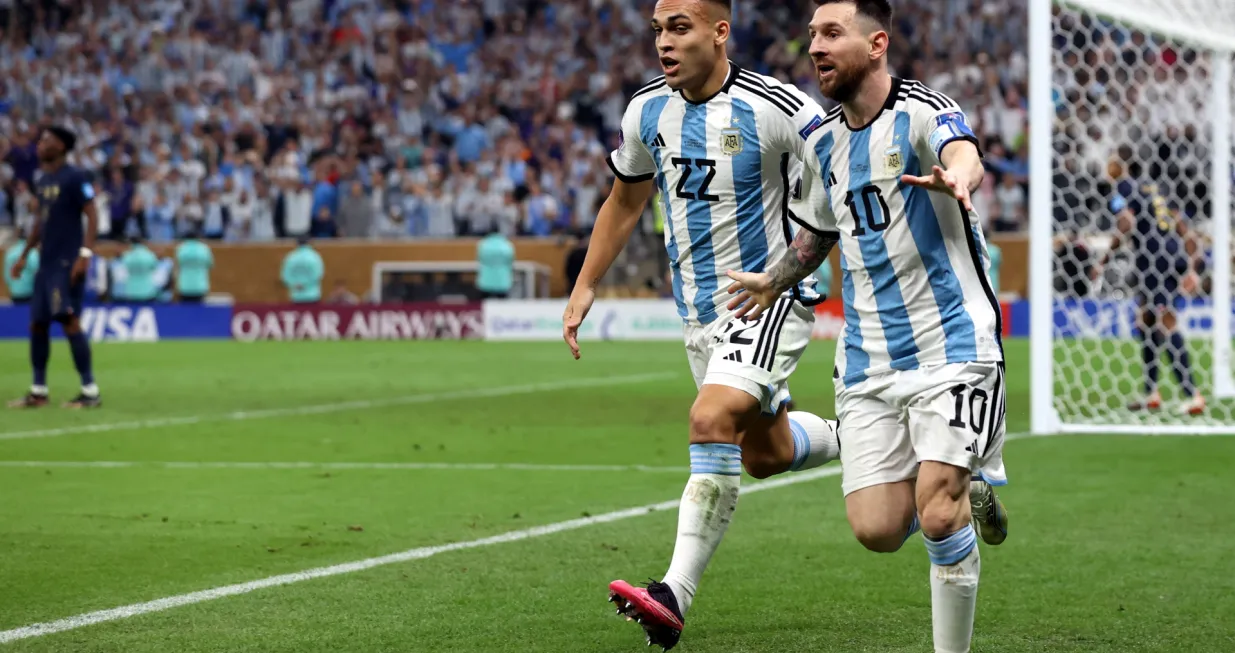 epa10372750 Lionel Messi of Argentina (R) reacts after scoring the 3-2 with Lautaro Martinez during the FIFA World Cup 2022 Final between Argentina and France at Lusail stadium, Lusail, Qatar, 18 December 2022. EPA/Tolga Bozoglu