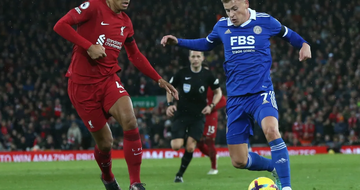 epa10383084 Virgil Van Dijk (L) of Liverpool in action against Harvey Barnes of Leicester during the English Premier League soccer match between Liverpool FC and Leicester City in Liverpool, Britain, 30 December 2022. EPA/Adam Vaughan EDITORIAL USE ONLY. No use with unauthorized audio, video, data, fixture lists, club/league logos or 'live' services. Online in-match use limited to 120 images, no video emulation. No use in betting, games or single club/league/player publications