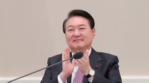 epa10379784 South Korean President Yoon Suk Yeol applauds during a report on business in the new year by the science and ICT ministry at the former presidential office Cheong Wa Dae in Seoul, South Korea, 28 December 2022, as Science and ICT Minister Lee Jong-ho reports to Yoon that South Korea's unmanned space vehicle Danuri has successfully entered the orbit of the moon earlier than planned. EPA/YONHAP/POOL SOUTH KOREA OUT/Yonhap/Pool