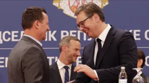 epa08688386 Advisor to the USA President on Kosovo-Serbia, Richard Grenell (L) shakes hands with Serbian President Aleksandar Vucic (R) following their meeting in Belgrade, Serbia, 22 September 2020. Grenell is visiting Serbia for talks with business leaders and government officials after signing an agreement between Serbia and Kosovo for economic relations at the White House on 04 September. EPA/ANDREJ CUKIC/Andrej Cukic