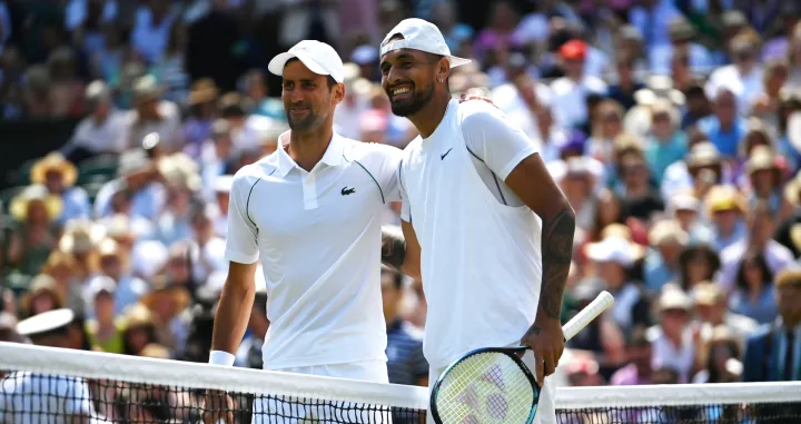 epa10064166 Nick Kyrgios (R) of Australia and Novak Djokovic of Serbia meet at the net before the start of the men's final match at the Wimbledon Championships, in Wimbledon, Britain, 10 July 2022. EPA/NEIL HALL  EDITORIAL USE ONLY