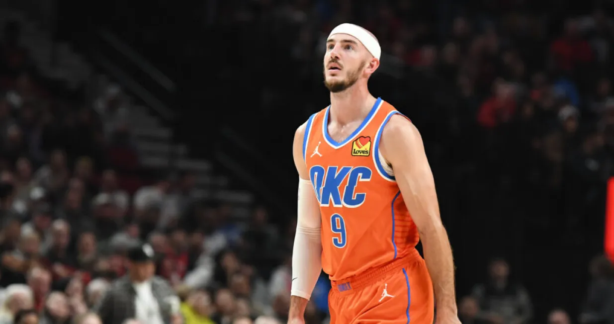 Nov 1, 2024; Portland, Oregon, USA; Oklahoma City Thunder guard Alex Caruso (9) looks down court during the second quarter at Moda Center. Mandatory Credit: Brian Murphy-Imagn Images