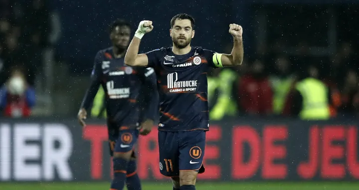 epa10386733 Teji Savanier of Montpellier HSC celebrates the 1-2 goal during the soccer Ligue 1 match between Montpellier HSC and Olympique Marseille, in Montpellier, France, 02 January 2023. EPA/Guillaume Horcajuelo