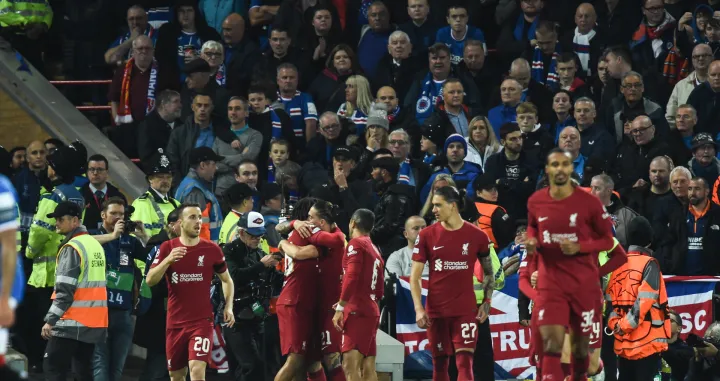 epa10223578 Trent Alexander-Arnold of Liverpool FC celebrates with team mates after scoring a goal during the UEFA Champions League group A soccer match between Liverpool FC and Rangers FC in Liverpool, Britain, 04 October 2022. EPA/Peter Powell