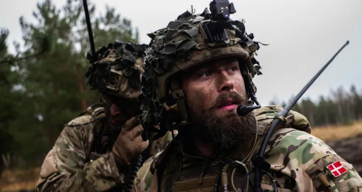 Royal Danish Army soldiers communicate with a radio during exercise Resolute Warrior 24 at Adaži, Latvia on 6 November 2024./NATO/