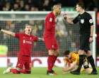 epa10394862 Darwin Nunez of Liverpool (L) and Fabinho of Liverpool (C) react to referee Andrew Madley (R) during the 3rd round FA Cup soccer match between Liverpool and Wolverhampton Wanderers at Anfield in Liverpool, Britain, 07 January 2023. EPA/ADAM VAUGHAN