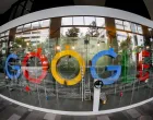 epa08873751 (FILE) A picture made with a fisheye lens shows the Google logo in Singapore, 06 December 2019 (reissued 10 December 2020). According to media reports on 10 December 2020, French data privacy regulator CNIL will impose over 100 million euros fines on US companies Google and Amazon for breaching EU privacy data rules. According to media reports, Google will have to pay 100 million euros and Amazon 35 million euros fines. EPA/WALLACE WOON *** Local Caption *** 55685412/Wallace Woon