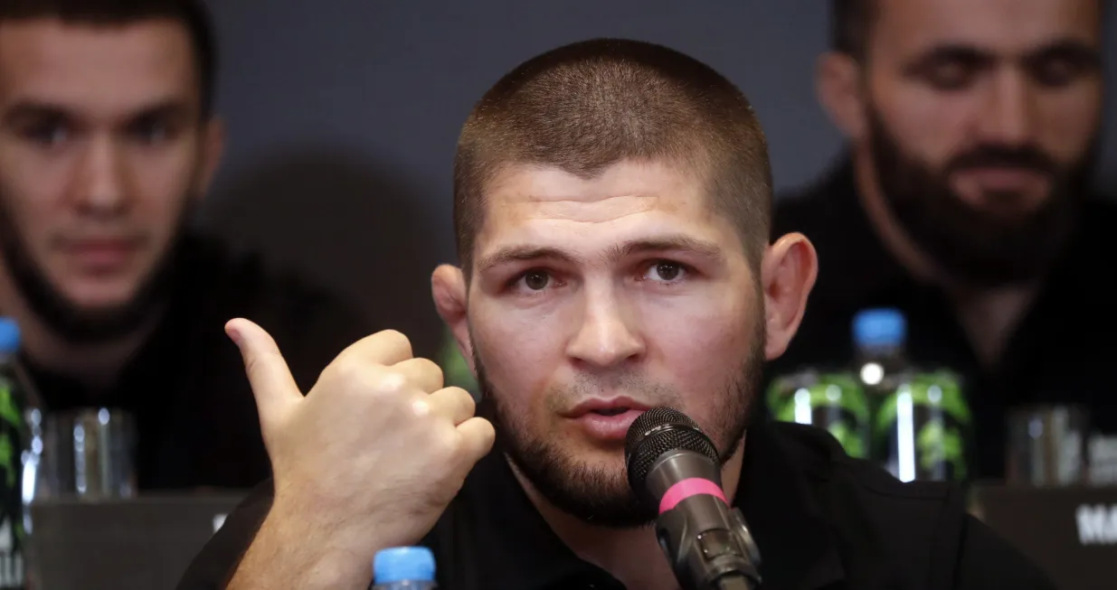 epa09418937 Former Russian mixed martial arts (MMA) fighter, UFC lightweight titleholder Khabib Nurmagomedov attends a press conference in Moscow, Russia, 18 August 2021. Khabib Nurmagomedov said that he became a shareholder of the UFC. EPA/MAXIM SHIPENKOV