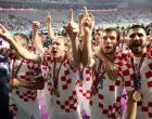 epa10370608 (from R) Martin Erlic, Borna Barisic, Domagoj Vida and Dejan Lovren of Croatia celebrate after the team won the FIFA World Cup 2022 third place soccer match between Croatia and Morocco at Khalifa International Stadium in Doha, Qatar, 17 December 2022. EPA/Tolga Bozoglu