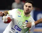 epa08962886 Blaz Janc of Slovenia in action during the Main Round match between Slovenia and Egypt at the 27th Men's Handball World Championship in Cairo, Egypt, 24 January 2021. EPA/Mohamed Abd El Ghany/POOL