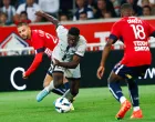 epa10132899 Paris Saint Germain's Nuno Mendes, Lille's Zhegrova Edon (C) and Lille's Bafode Diakite (R) in action during the French Ligue 1 soccer match between Lille and PSG in Lille, France, 21 August 2022. EPA/Mohammed Badra