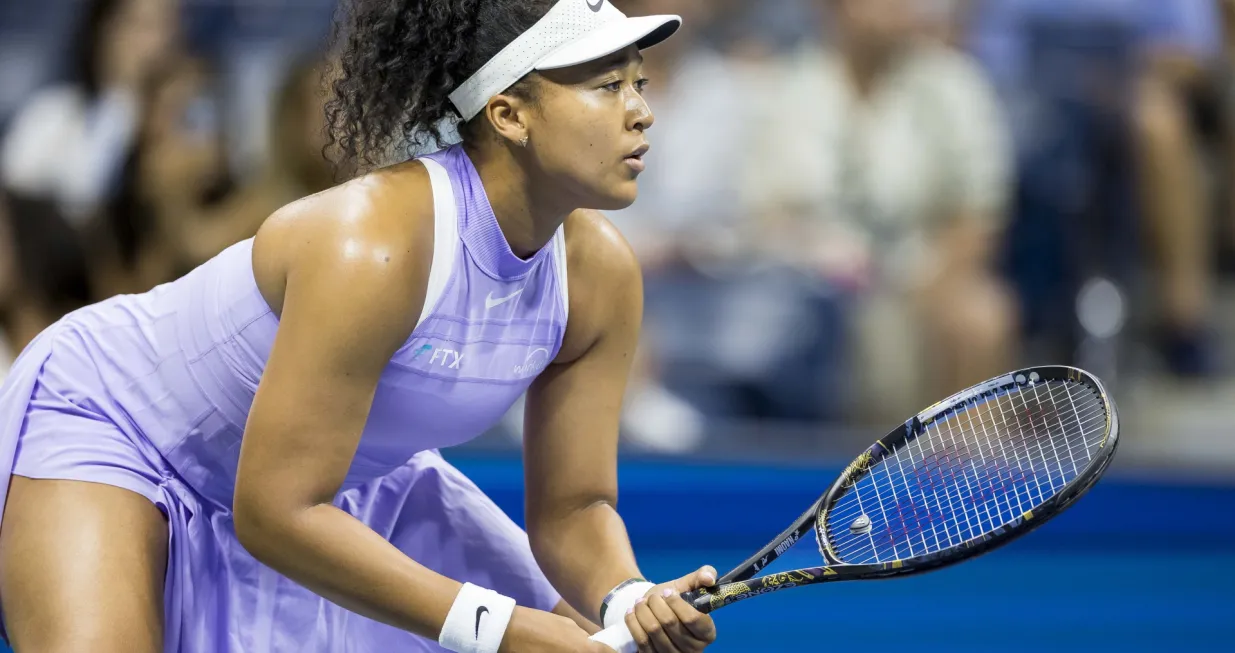 epa10148812 Naomi Osaka of Japan hits a return to Danielle Collins of the US during their first round match at the US Open Tennis Championships, at the USTA National Tennis Center in Flushing Meadows, New York, USA, 30 August 2022. The US Open runs from 29 August through 11 September. EPA/JUSTIN LANE