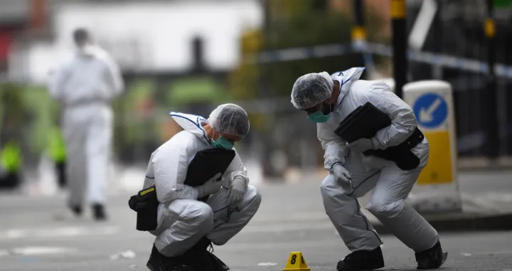 epa08650556 Forensics gather evidence inside a cordon near Hurst Street, following a major stabbing incident in the centre of Birmingham, Britain 06 September 2020. Police has confirmed that one man was killed and two people were critically injured during a 'random' stabbing attack last night. EPA/NEIL HALL/Neil Hall