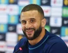 epa10353633 England's Kyle Walker smiles during a press conference in Doha, Qatar, 07 December 2022. England will face France in their FIFA World Cup 2022 quarter final soccer match on 10 December 2022. EPA/NEIL HALL