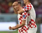 epa10370272 Mislav Orsic of Croatia celebrates with teammate Ivan Perisic (R) after scoring the 2-1 lead during the FIFA World Cup 2022 third place soccer match between Croatia and Morocco at Khalifa International Stadium in Doha, Qatar, 17 December 2022. EPA/Tolga Bozoglu