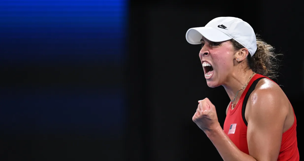 epa10388106 Madison Keys of the USA celebrates during her match against Katie Swan of Britain during the 2023 United Cup City Final tennis match between Britain and the USA at Ken Rosewall Arena in Sydney, Australia, 04 January 2023. EPA/DEAN LEWINS EDITORIAL USE ONLY AUSTRALIA AND NEW ZEALAND OUT