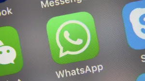 epa09442519 (FILE) - The logo of mobile application WhatsApp (C) displayed on a smartphone screen in Taipei, Taiwan, 26 September 2017 (reissued 02 September 2021). The Irish Data Protection Commissioner (DPC) in a statement on 02 September 2021 announced it had 'imposed a fine of 225 million euro on WhatsApp' Ireland over the messenger application's handling data sharing with its parent company Facebook. EPA/RITCHIE B. TONGO *** Local Caption *** 55842512/Ritchie B. Tongo