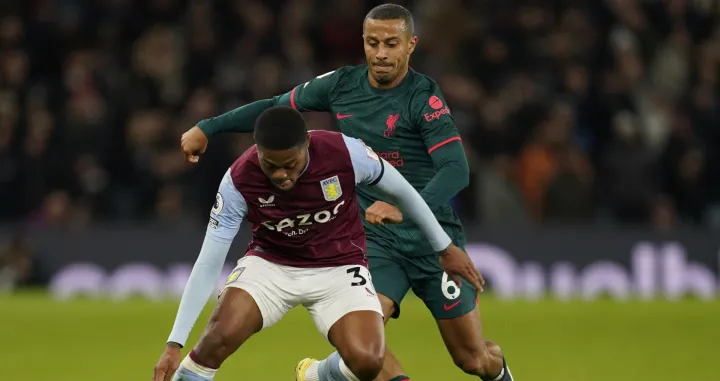 epa10378742 Aston Villa's Leon Bailey (L) in action against Liverpool's Thiago (R) during the English Premier League soccer match between Aston Villa and Liverpool in Birmingham, Britain, 26 December 2022. EPA/Tim Keeton EDITORIAL USE ONLY. No use with unauthorized audio, video, data, fixture lists, club/league logos or 'live' services. Online in-match use limited to 120 images, no video emulation. No use in betting, games or single club/league/player publications