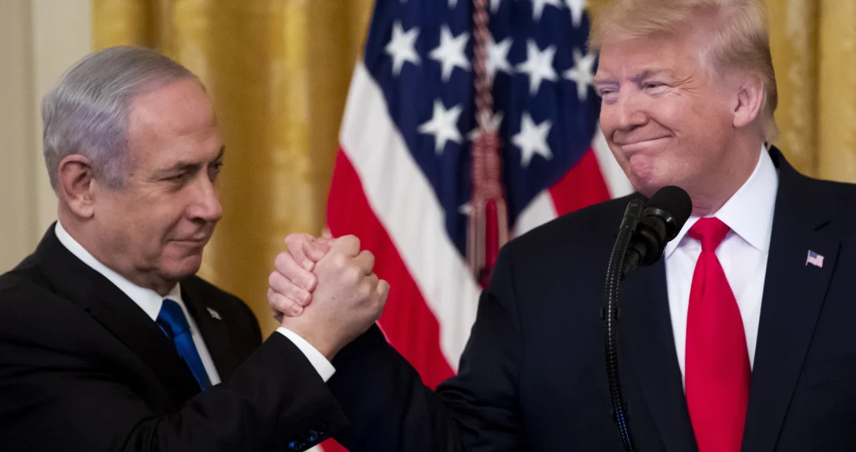 epa08939629 (FILE) US President Donald J. Trump (R) shakes hands with Prime Minister of Israel Benjamin Netanyahu (L) while unveiling his Middle East peace plan in the East Room of the White House, in Washington, DC, USA, 28 January 2020. The presidency of Donald Trump, which records two presidential impeachments, will end at noon on 20 January 2021. EPA/MICHAEL REYNOLDS *** Local Caption *** 55828472/Michael Reynolds