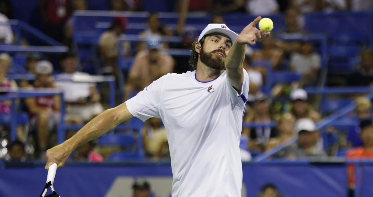 epa10106564 Reilly Opelka of the USA in action against Nick Kyrgios of Australia during their men's singles match at the Citi Open ATP tennis tournament at the Rock Creek Park Tennis Center in Washington, DC, USA, 04 August 2022. EPA/WILL OLIVER