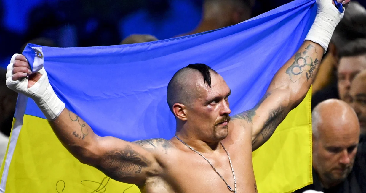 epa10131332 Oleksandr Usyk of Ukraine reacts after defeating Anthony Joshua of Great Britain during the world heavyweight title fight between IBF, WBA and WBO titleholder Oleksandr Usyk and his challenger Anthony Joshua, at the Jeddah Superdome, Saudi Arabia, 21 August 2022. It is the second bout between the two after Usyk beat Joshua in London in September 2021. EPA/ALI HAMED KHAMAJ