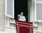 epa10395421 A handout picture provided by the Vatican Media shows Pope Francis waving from the window of his office overlooking Saint Peter's Square as he leads his Angelus prayer, in Vatican City, 08 January 2023. EPA/VATICAN MEDIA HANDOUT HANDOUT EDITORIAL USE ONLY/NO SALES/Vatican Media Handout