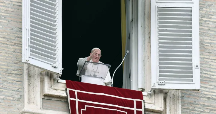 epa10395421 A handout picture provided by the Vatican Media shows Pope Francis waving from the window of his office overlooking Saint Peter's Square as he leads his Angelus prayer, in Vatican City, 08 January 2023. EPA/VATICAN MEDIA HANDOUT HANDOUT EDITORIAL USE ONLY/NO SALES/Vatican Media Handout