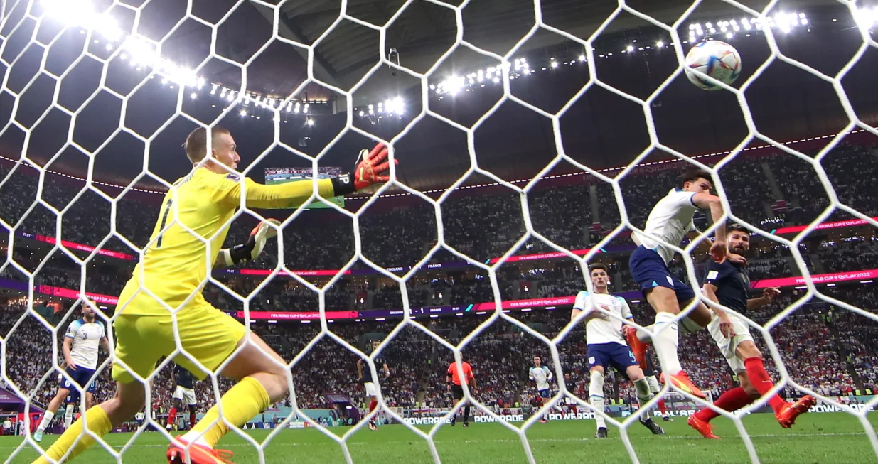 epa10360286 Olivier Giroud of France (R) scores the second goal of his team during the FIFA World Cup 2022 quarter final soccer match between England and France at Al Bayt Stadium in Al Khor, Qatar, 10 December 2022. EPA/Tolga Bozoglu