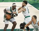 epa09946000 Boston Celtics forward Jayson Tatum (C) defends against Milwaukee Bucks center Bobby Portis (L) during the second half of NBA Eastern Conference semifinal playoff game six between the Milwaukee Bucs and Boston Celtics at Fiserv Forum in Milwaukee, Wisconsin, USA, 13 May 2022. EPA/KAMIL KRZACZYNSKI SHUTTERSTOCK OUT