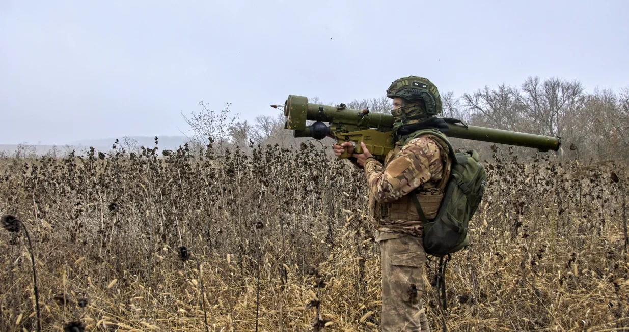 epa10300725 A member of Ukraine's National Guard with a man-portable surface-to-air missile system (MANPAD) keeps watch while standing at a position not far from Kharkiv, northeastern Ukraine, 11 November 2022, amid Russia's invasion. Kharkiv and surrounding areas have been the target of heavy shelling since February 2022, when Russian troops entered Ukraine starting a conflict that has provoked destruction and a humanitarian crisis. At the beginning of September, the Ukrainian army pushed Russian forces from occupied territory in the northeast of the country in counterattacks. EPA/SERGEY KOZLOV/Sergey Kozlov