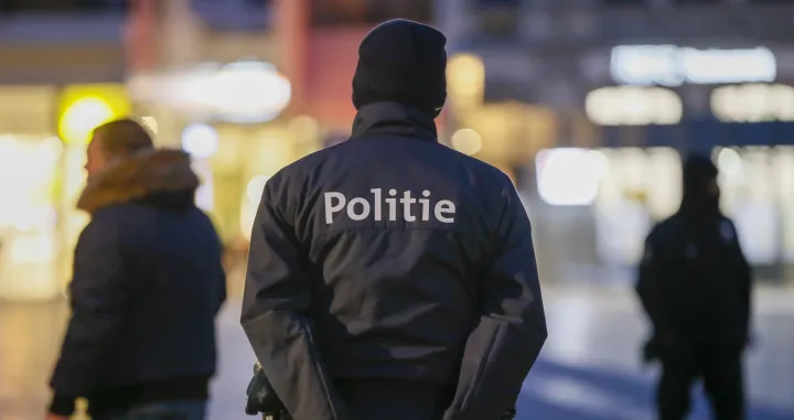 epa08975806 Police officers patrol in the center of Turnhout to prevent a protest against curfew and Covid-19 measures, in Turnhout, Belgium, 30 January 2021. Since the Netherlands has witnessed violent protests the municipal authorities of Turnhout and cities at the border have been on high alert. EPA/JULIEN WARNAND/Julien Warnand