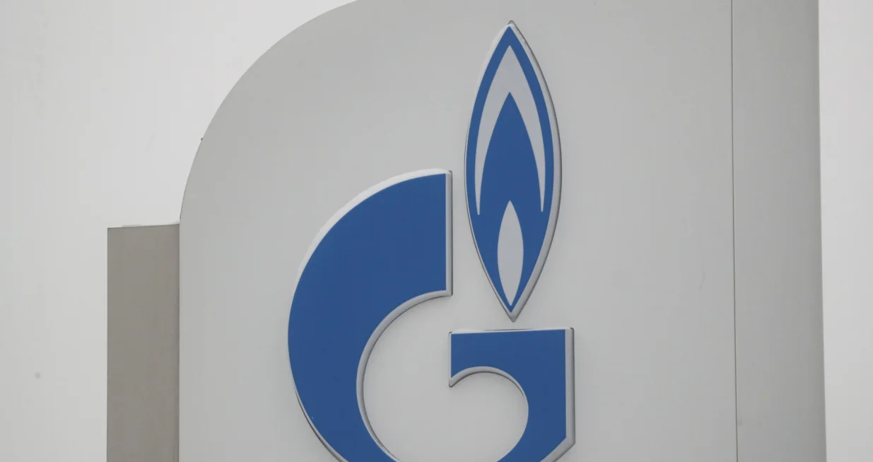 epa10334410 Russian state-controlled gas giant Gazprom logo seen at a Gazprom Neft gas station in Moscow, Russia, 28 November 2022. Gazprom decided not to reduce the supply of gas through Ukraine, as Moldova eliminated violations of payment for gas supplies in November and paid off with Russia for the fuel that settled in Ukraine. Gazprom reported that they were going to start mothballing equipment at the 'Portovaya' and 'Slavyanskaya' compressor stations, which pumped fuel into the Nord Stream pipelines. EPA/MAXIM SHIPENKOV/Maxim Shipenkov