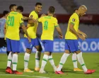 epa08826433 Arthur Melo (C) of Brazil celebrates with his teammates after scoring the 1-0 lead during a match of the South American Qualifiers for the World Cup in Qatar between the teams of Uruguay and Brazil, at the Centenario stadium in Montevideo, Uruguay, 17 November 2020. EPA/Raul Martinez/POOL