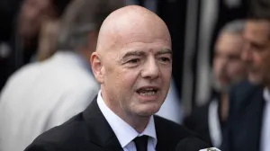 epa10386385 FIFA President Gianni Infantino attends the wake for Edson Arantes do Nascimento 'Pele', at the Vila Belmiro stadium in the city of Santos, Brazil, 02 January 2023. Several Brazilian soccer fans spent the night lining up to attend Pele's wake who died on 29 December 2022 at the age of 82. EPA/Isaac Fontana